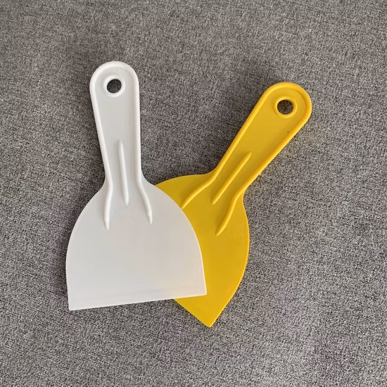 Rotes Kunststoff-Spachtelmesser